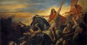 cuadro de La Batalla de Tolbiac (497). Muestra a Clodoveo a caballo mirando al cielo y pidiendo a Dios ayuda.